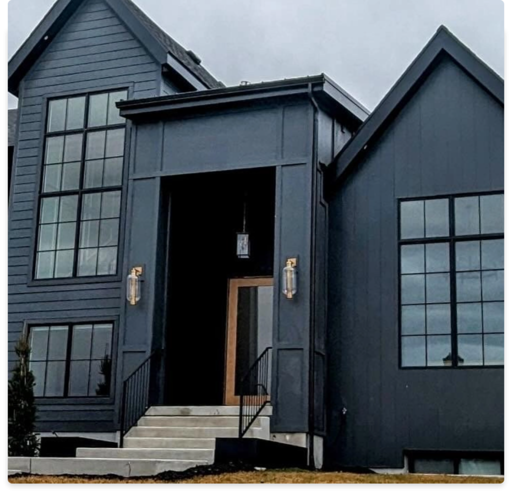 Carved Wood Siding, image of part of a house with dark siding