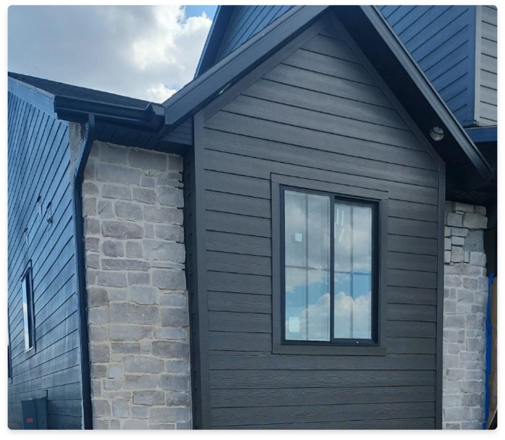 Charter Oak Siding, image of house with gray siding