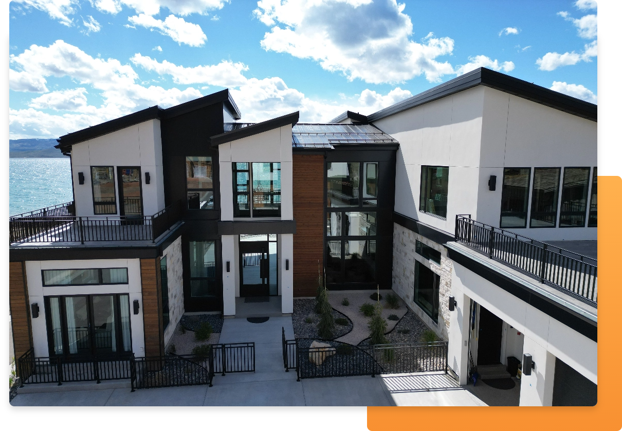 Choosing the Right Exterior Siding, image of part of a beautiful structure near a body of water